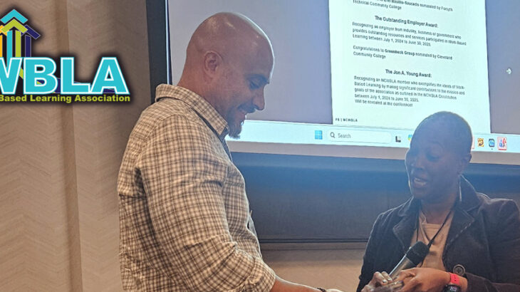 Miller giving presentation at conference