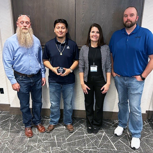 Elvi Basilio-Saucedo of Forsyth Technical Community College receives the Student of the year award at the NCWBLA 2025 conference.